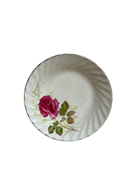 White vintage saucer with rose detail