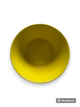 Yellow bowl with green exterior