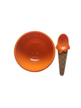 Orange ice cream bowl and spoon