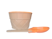 Orange ice cream bowl and spoon