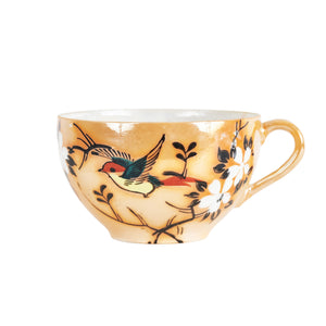 Orange Tea Cup With Foliage Design