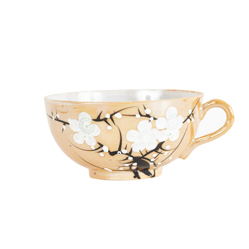 Orange Tea Cup With Blossom Design